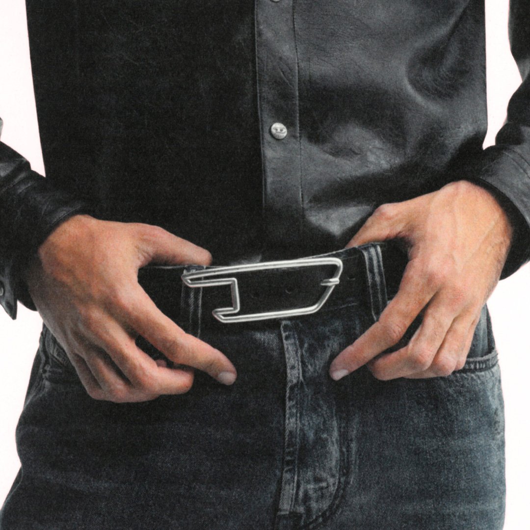 Model wearing black jeans with the new B-D Line Belt, only at Diesel 